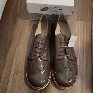 Brown patent leather dress shoes